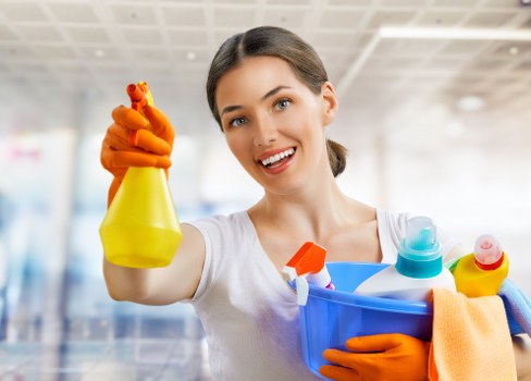 Kitchen surfaces being cleaned in a Docklands home